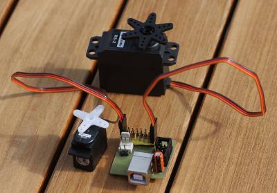 [picture of assembled bord and two rc servos]